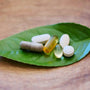 Natural Nootropics: Natural supplements on top of a leaf